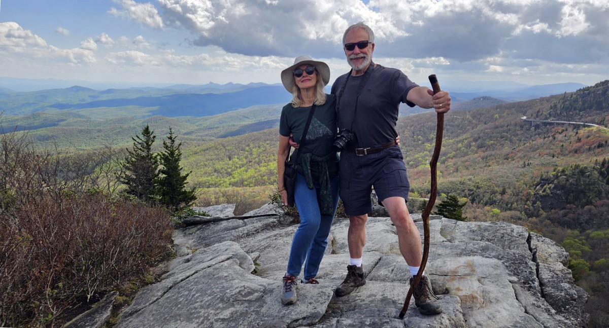 Stan and Lynn Deatherage on top of a Mountain